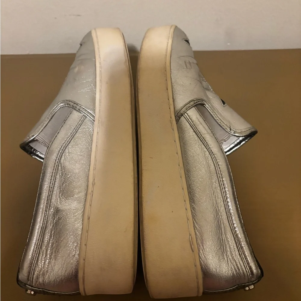 Michael Kors Silver Slip-On Shoes with Black Star Accents